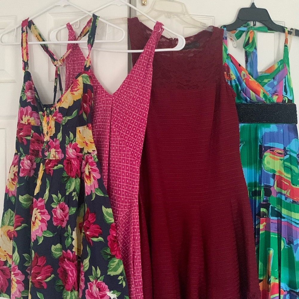 Bundle of 4 dresses. Sizes M, 4, 6, S